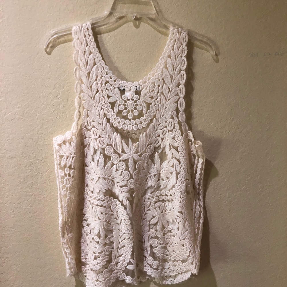 Mesh shirt with stitch over.